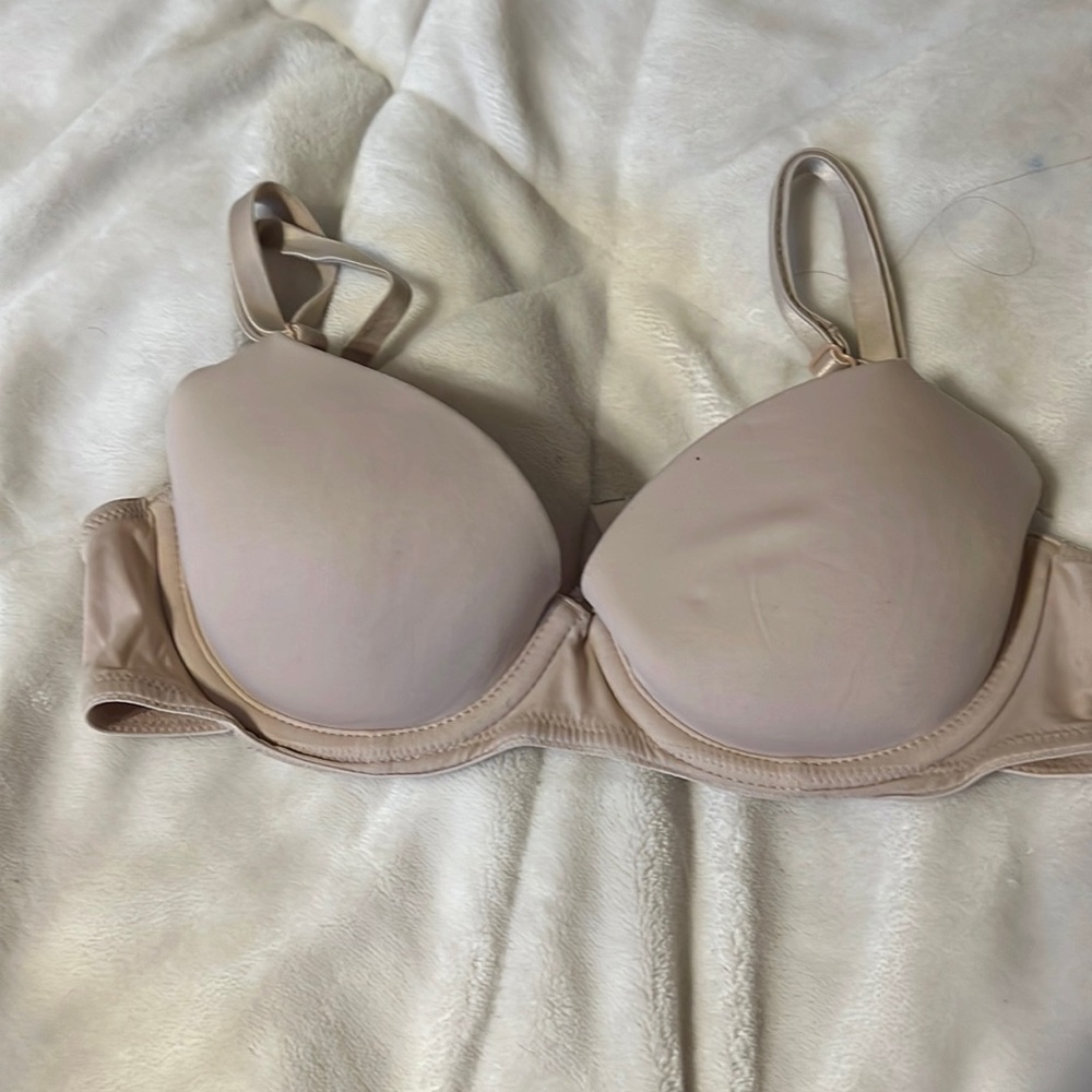 Trainer bra. The tag has washed away . I believe it is a 32A cup .